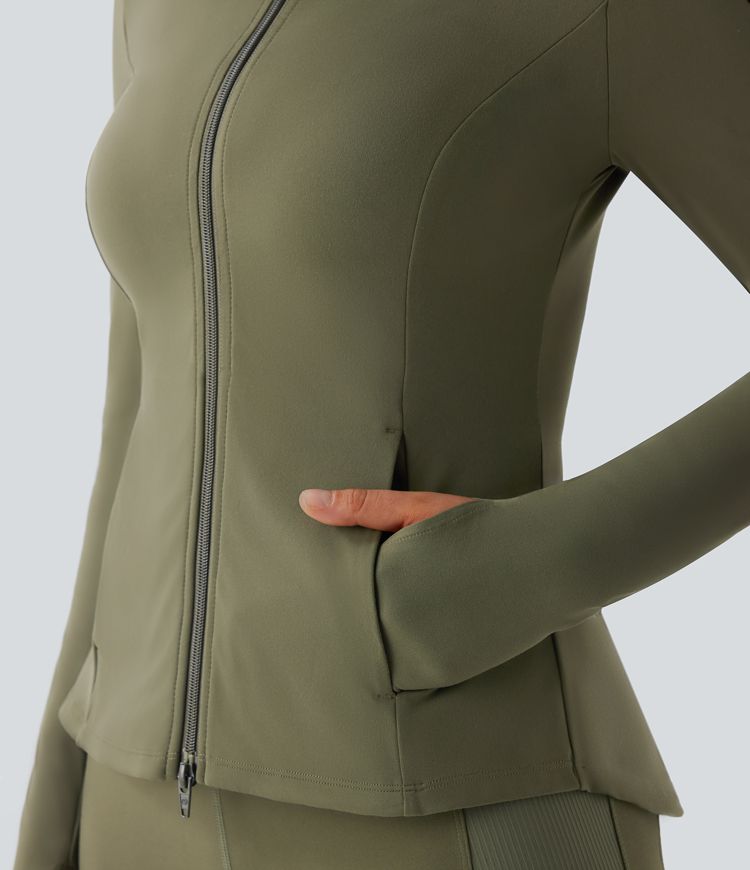ColaSoft™ | Slim riding jacket with high neck, thumb holes and pleated zip