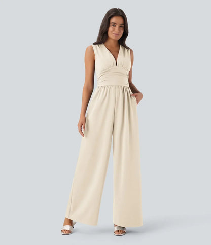 ColaSuit™ | Sleeveless party jumpsuit with V‑neck, side pockets and invisible zip (Easy Peezy)
