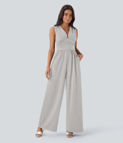 ColaSuit™ | Sleeveless party jumpsuit with V‑neck, side pockets and invisible zip (Easy Peezy)